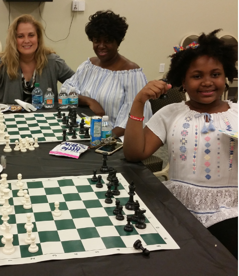 Photo of girls playing chess