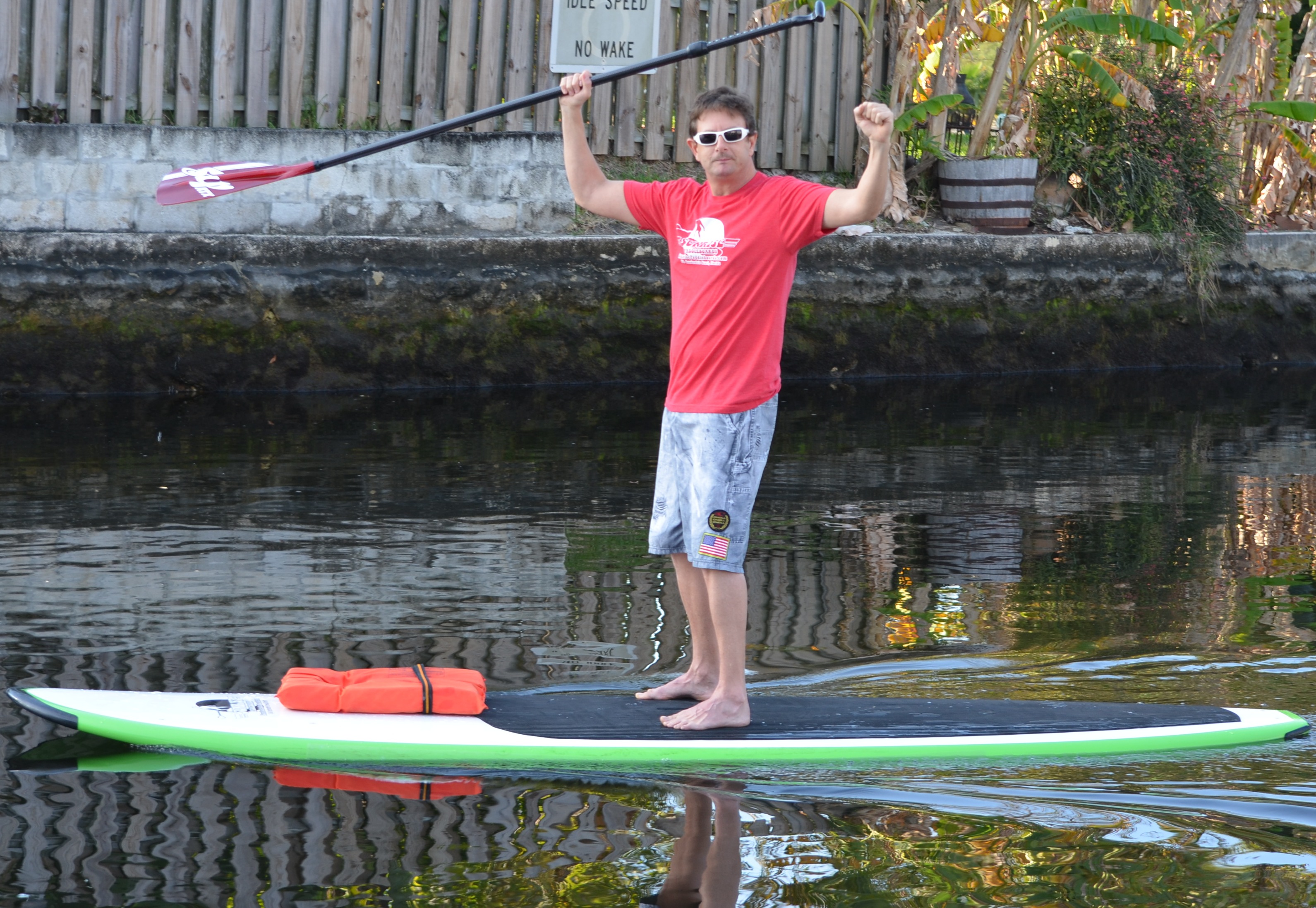 Brian on paddleboard cheers 2 2013